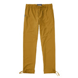 Trailhead Pants showcased in a mustard color